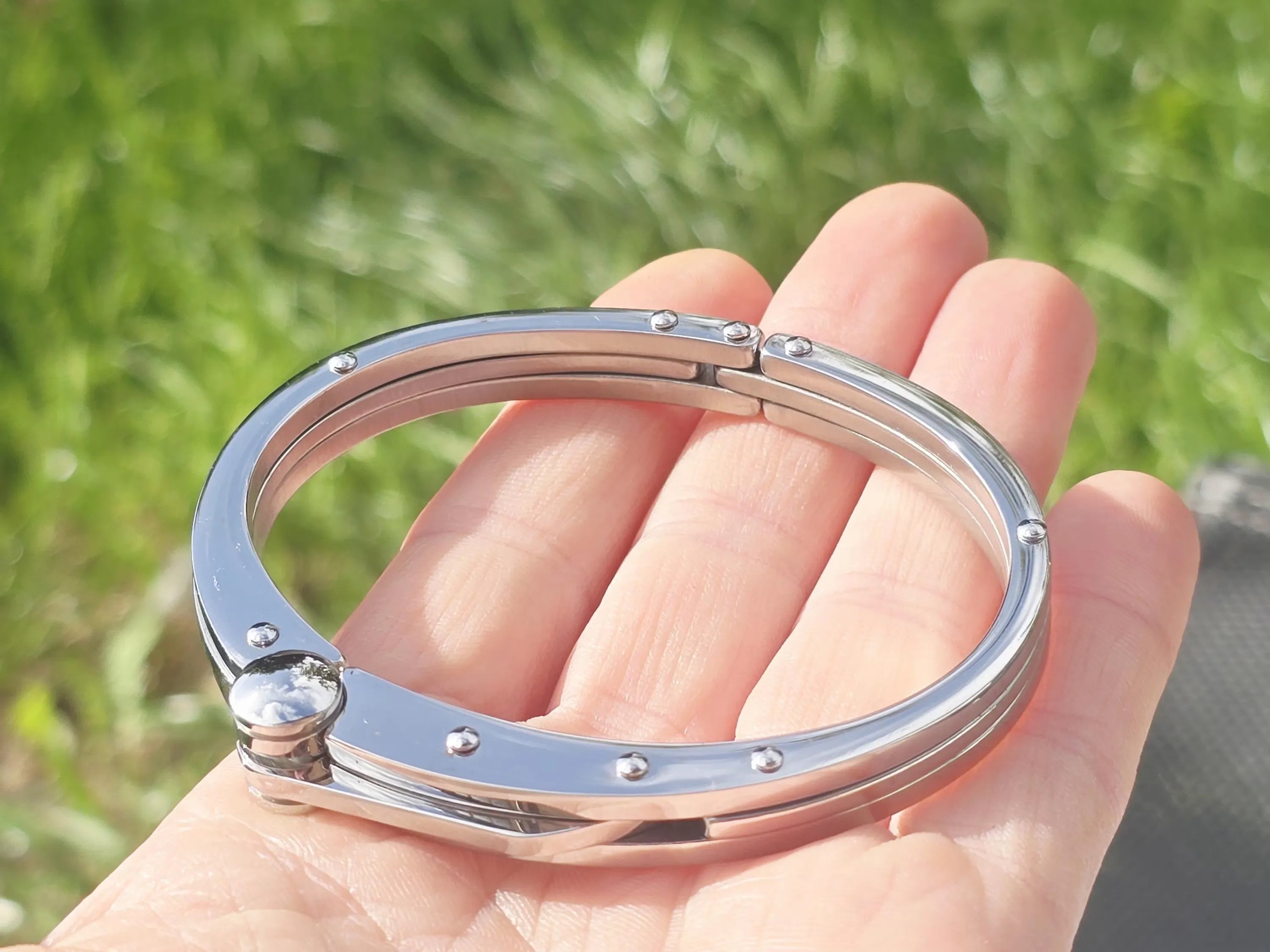 Braccialetto alla moda da uomo in acciaio inossidabile argentato con manette